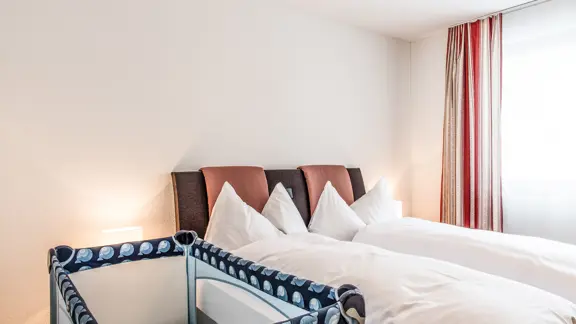 Typical bedroom with a cot