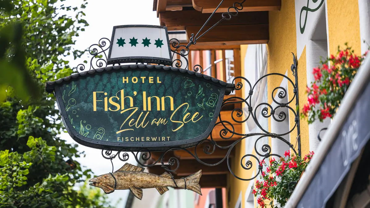 Hotel Fish Inn Zell Am See Exterior Sign